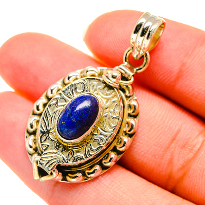 Lapis lazuli pendant close-up with oval blue stone and circular bail ring