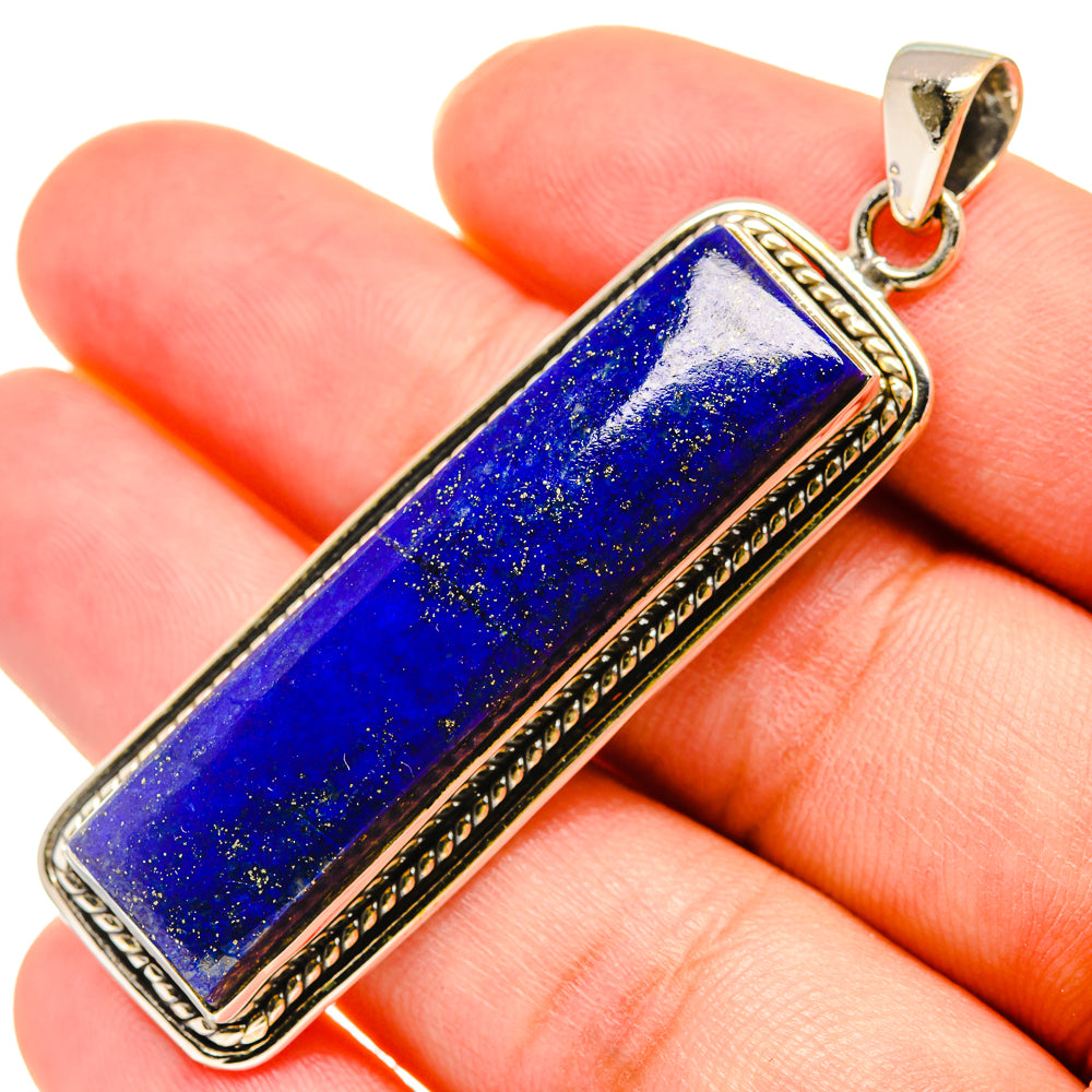 Rectangular lapis lazuli pendant in 925 sterling silver, blue stone close-up and bail.