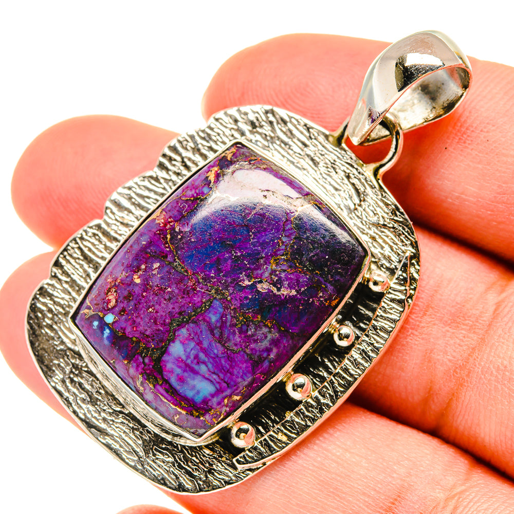 Silver pendant with square purple-blue gemstone and loop bail
