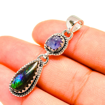 925 sterling silver pendant with oval blue stone and iridescent ammolite drop