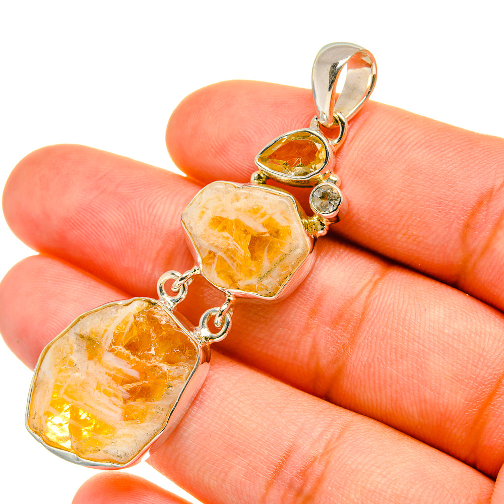 Rough citrine pendant, yellow rough stones in silver bezel links with small round clear gemstones