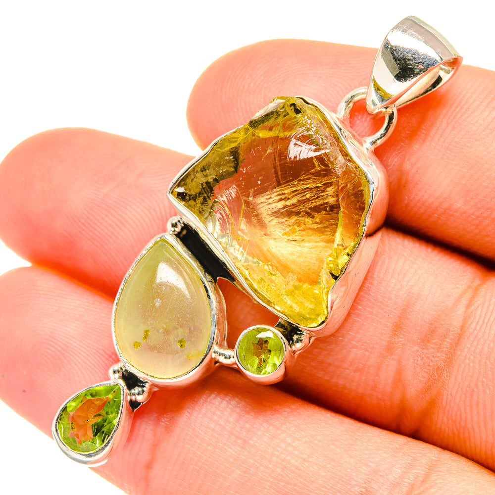 Rough stone pendant in 925 sterling silver with yellow-green prehnite and peridot accents