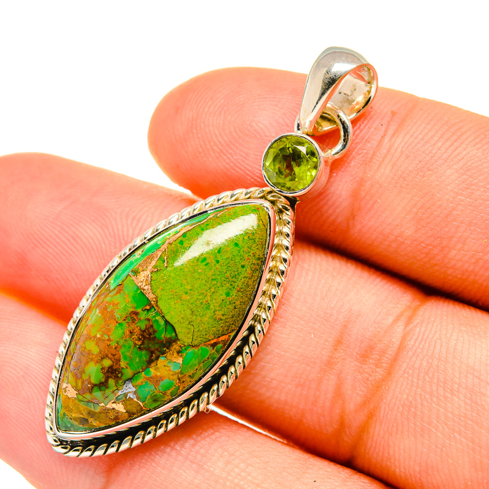 Green turquoise teardrop pendant with round peridot-green stone and silver bezel bail