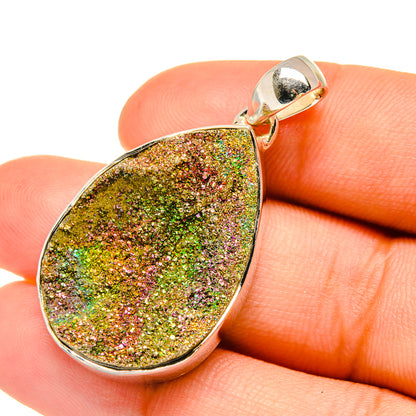 Teardrop druzy pendant with multicolor pyrite sparkle and silver bail in close-up