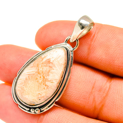 Scolecite pendant in sterling silver with peach teardrop stone and small bead accents
