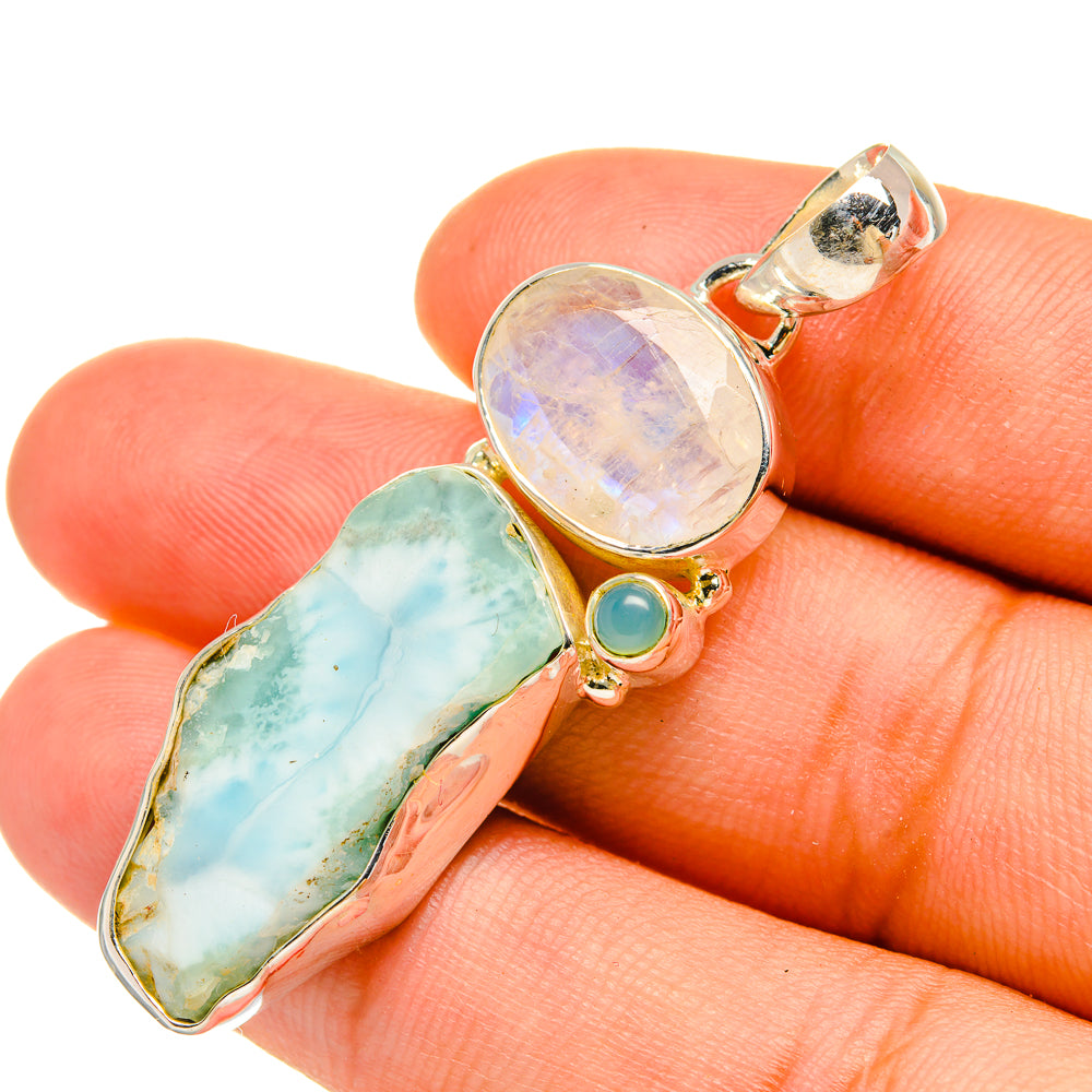 Pendant close-up: elongated aqua chalcedony, oval rainbow moonstone, green cabochon