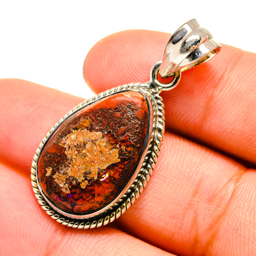 Red jasper teardrop pendant in sterling silver bezel with bail and loop clasp