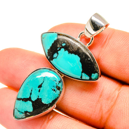 Sterling silver turquoise pendant with two teardrop cabochons, one on top