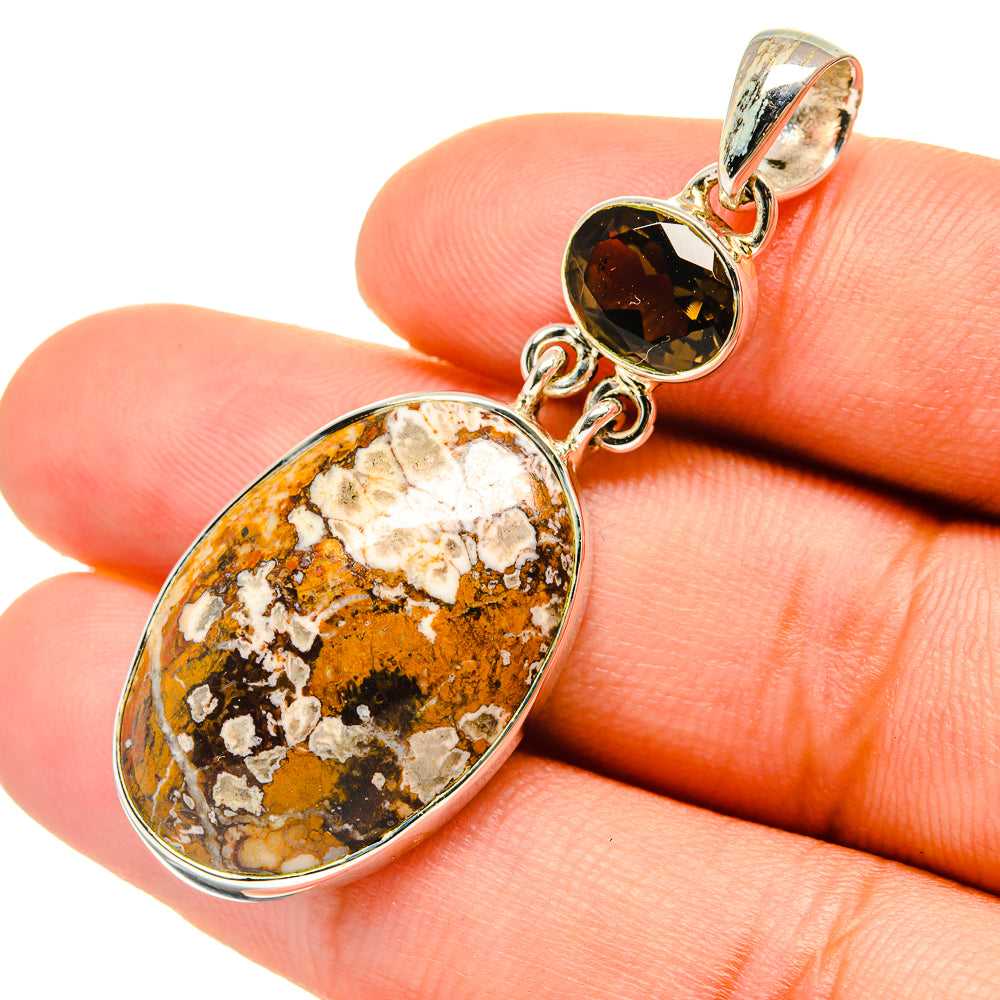 Jasper pendant with dark smoky quartz stone, silver links, and bail on finger