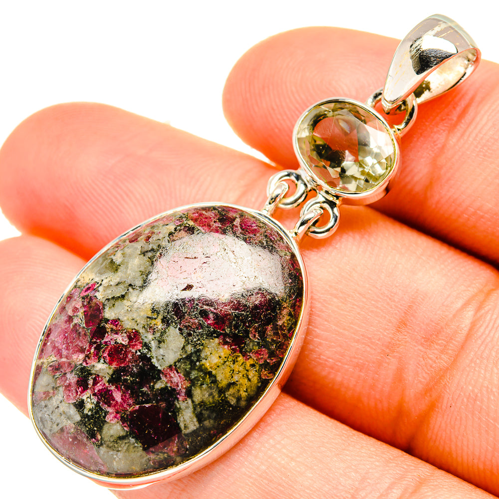 Oval multicolor gemstone pendant in sterling silver with round green stone connector