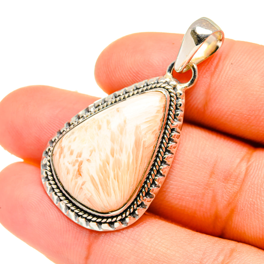 Teardrop pale peach gemstone pendant in sterling silver with rope border