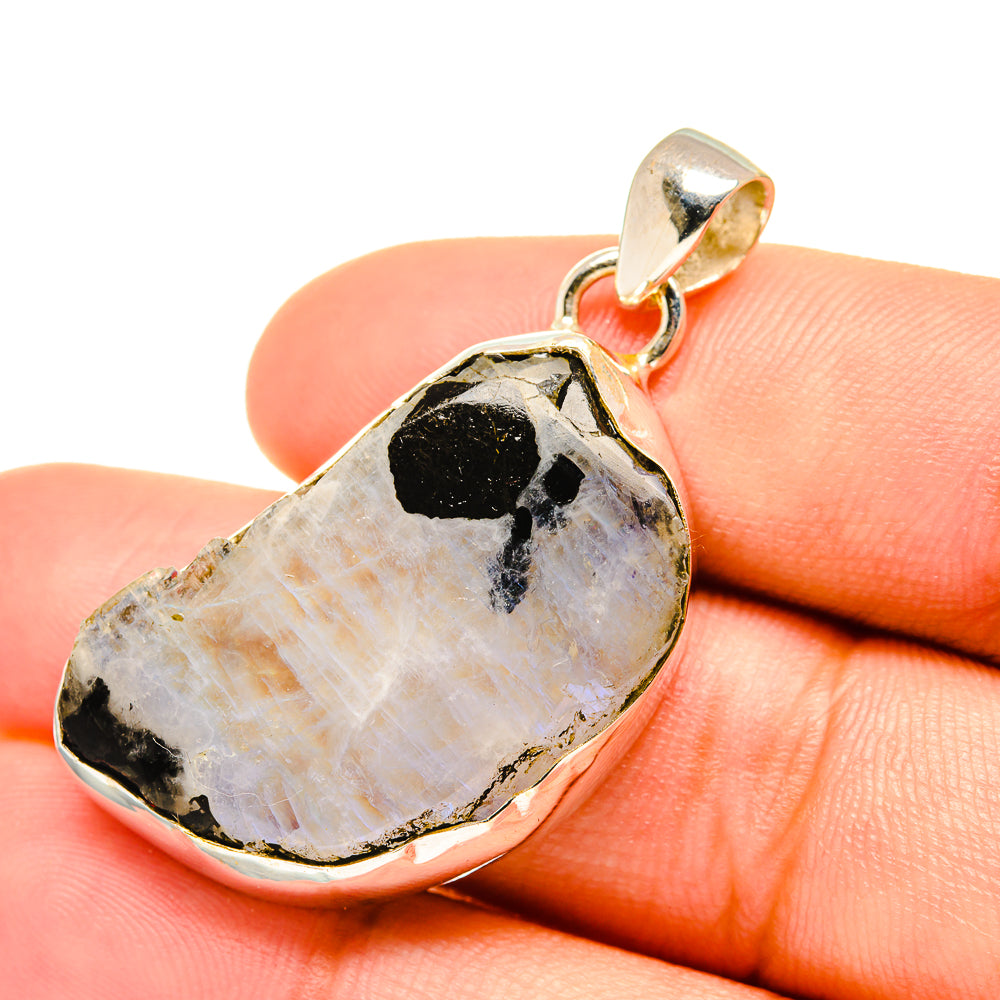 Rough moonstone pendant in sterling silver bezel, with small bail loop.