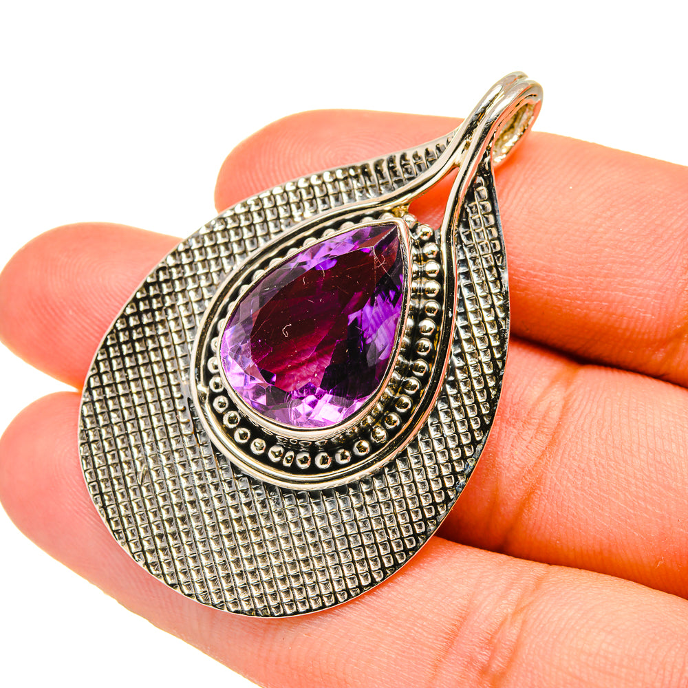 Sterling silver teardrop pendant with faceted amethyst gemstone