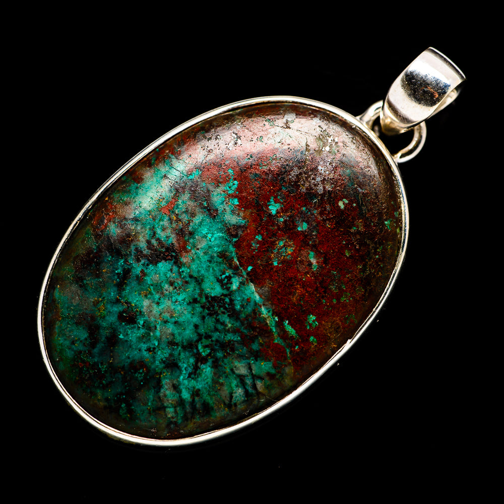 Sterling silver oval pendant with teal green and red-brown mottled patina and bail
