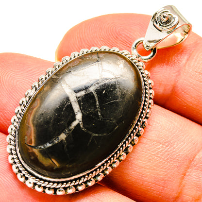925 sterling silver septarian geode pendant with oval black stone cabochon and bail