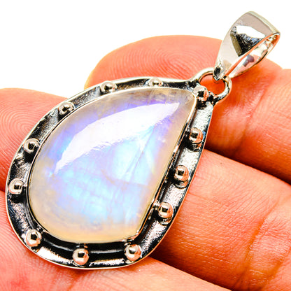 Sterling silver moonstone pendant with teardrop rainbow iridescent stone