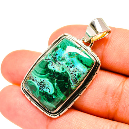 Green-and-blue malachite chrysocolla stone pendant in rectangular silver bezel