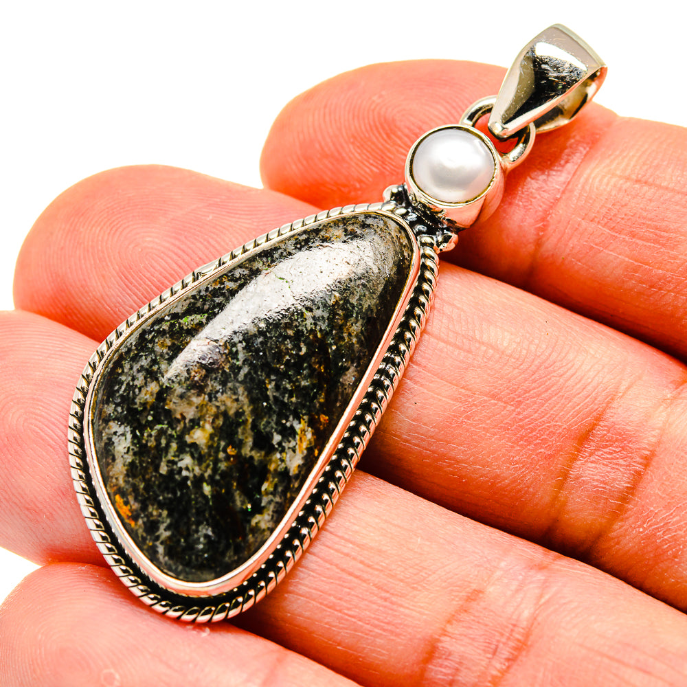 Sterling silver pendant with teardrop astrophyllite stone and white cultured pearl