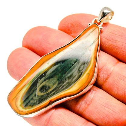 Imperial jasper teardrop pendant in 925 sterling silver, orange and green on hand