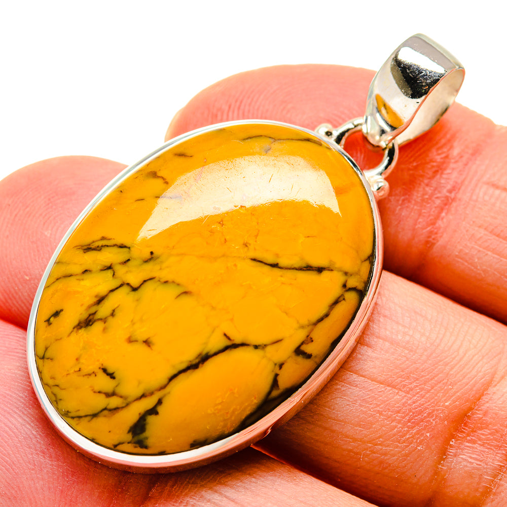 Sterling silver picture jasper pendant with oval orange cabochon and black veining