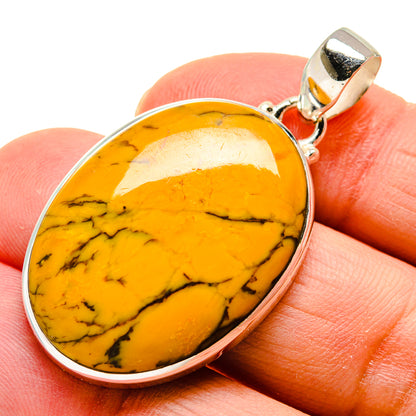 Sterling silver picture jasper pendant with oval orange cabochon and black veining