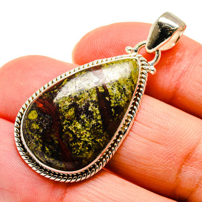 Teardrop green opal pendant close-up, sterling silver bezel with rope-like edge