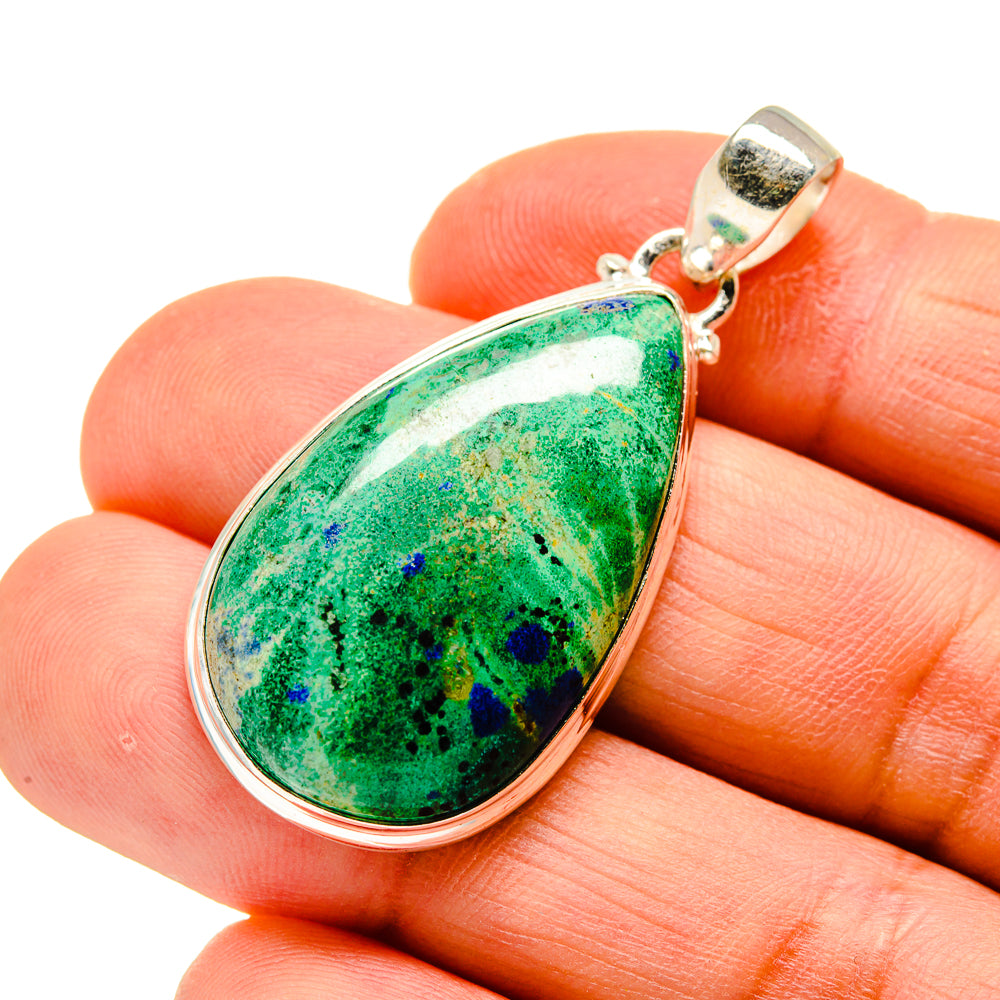 Teardrop chrysocolla pendant with green gemstone and blue speckles, silver bezel and bail