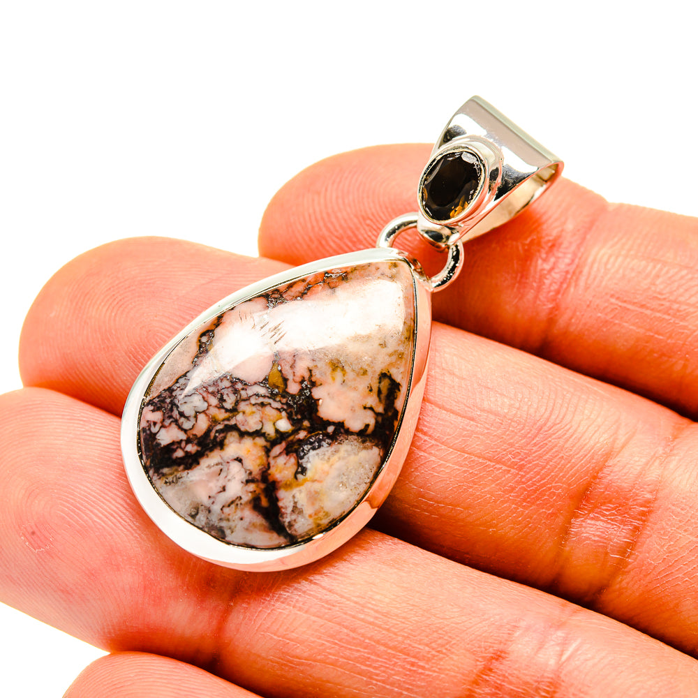 Sterling silver teardrop pendant with orange agate and black onyx