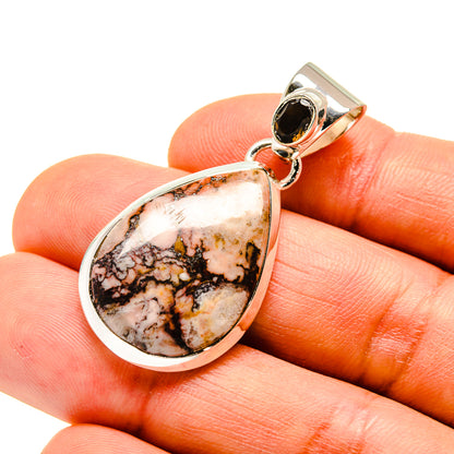 Sterling silver teardrop pendant with orange agate and black onyx