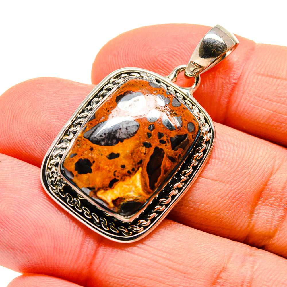 Sterling silver pendant with square orange chert breccia stone and ornate rope bezel