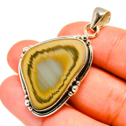 Willow Creek jasper pendant, oval teardrop stone with yellow-green bands in silver setting