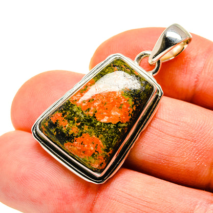 Unakite pendant with orange-green stone in silver bezel and loop bail on top