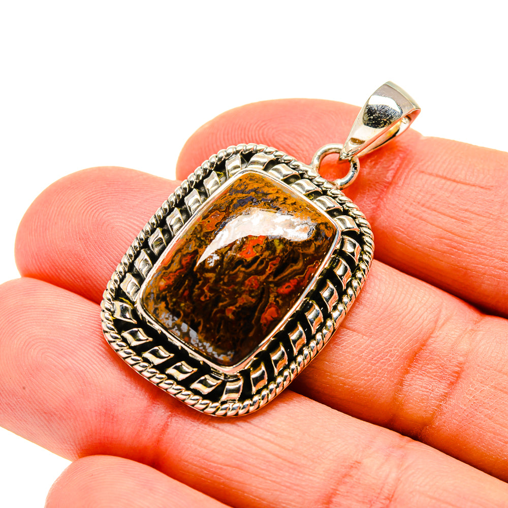 Moroccan agate pendant in square amber-and-black stone, framed in silver-tone metal