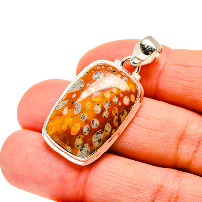 Mookaite gemstone pendant in silver with oval orange speckled stone bezel