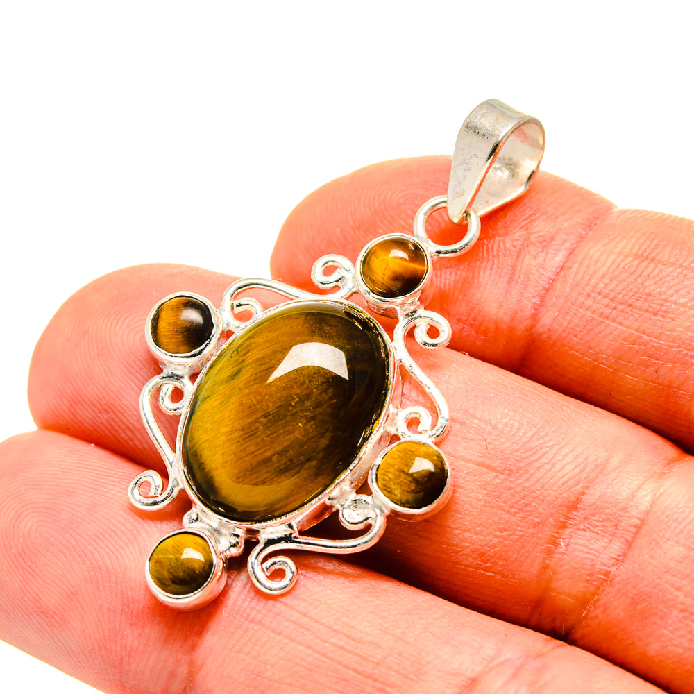Tiger eye pendant in 925 sterling silver with oval tiger eye cabochon and beaded accents