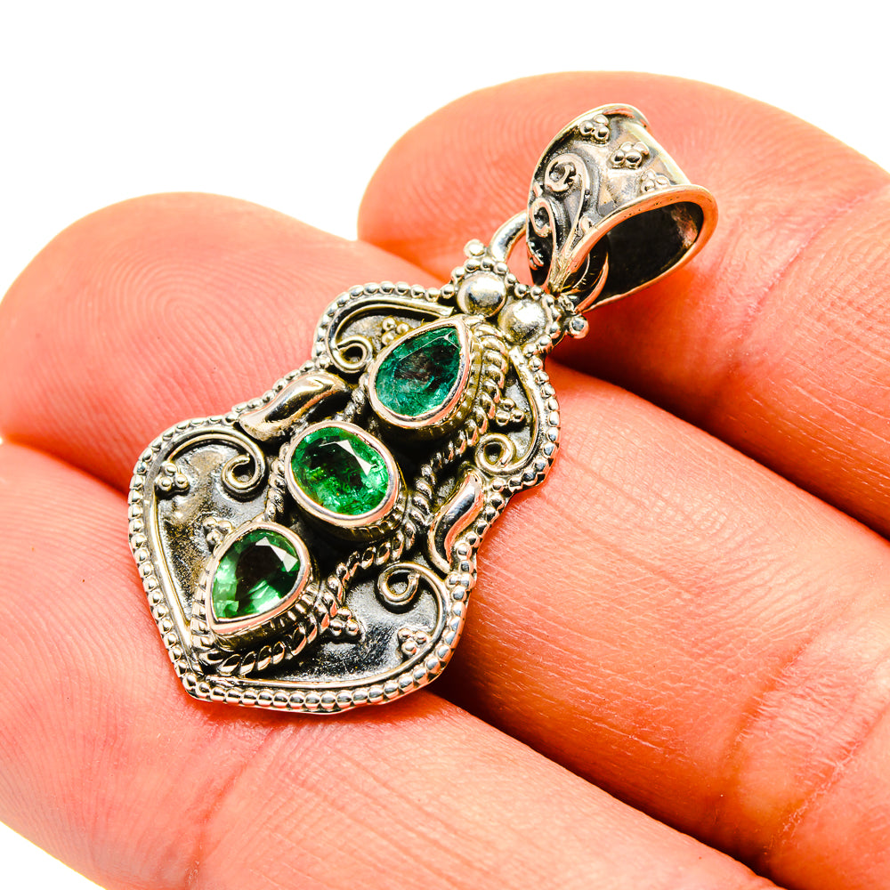 Heart-shaped emerald pendant in 925 sterling silver with three green gemstone drops
