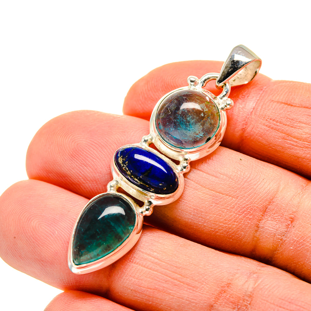 Gemstone pendant with round blue stone, oval green stone, oval aqua stone in bezel