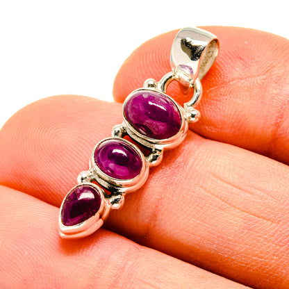 Oval pink tourmaline pendant, sterling silver setting with 3 stones, close-up on bail