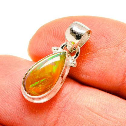 Sterling silver teardrop opal pendant with amber stone and bail