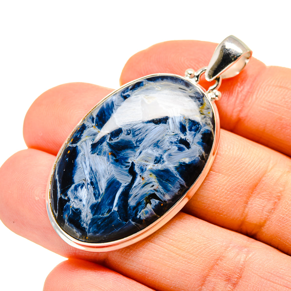 Sterling silver pietersite pendant with oval blue-and-white stone, round bail