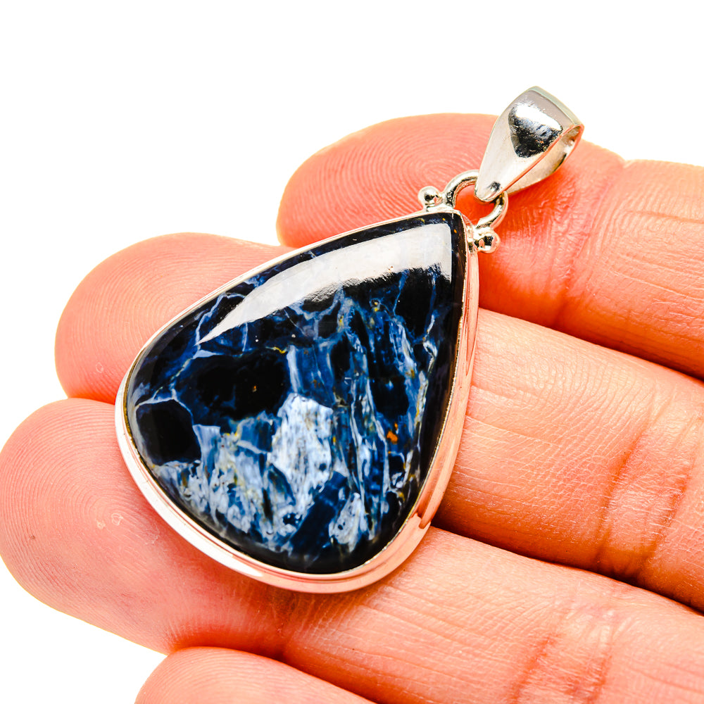 Pietersite pendant in teardrop frame, blue stone with sterling silver border and bail