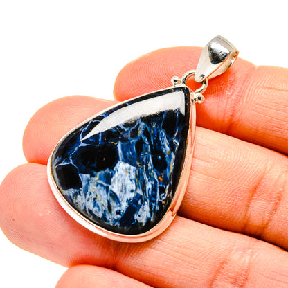 Pietersite pendant in teardrop frame, blue stone with sterling silver border and bail