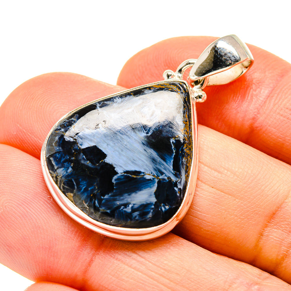 Pietersite pendant in teardrop silver bezel with blue and black stone and bail