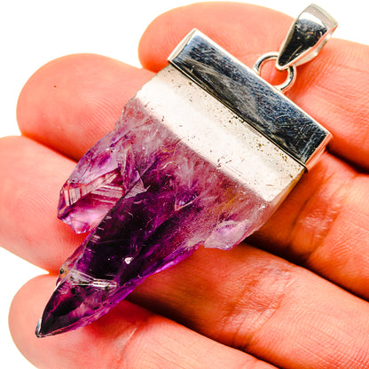 Amethyst stalactite pendant with silver bezel and bail, purple crystal point