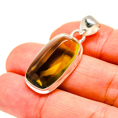 Oval amber quartz pendant with 925 sterling silver bezel and bail
