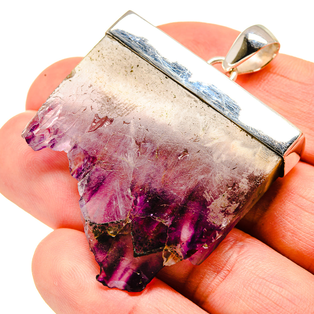 Amethyst stalactite pendant with sterling silver bezel and bail, purple crystal cluster