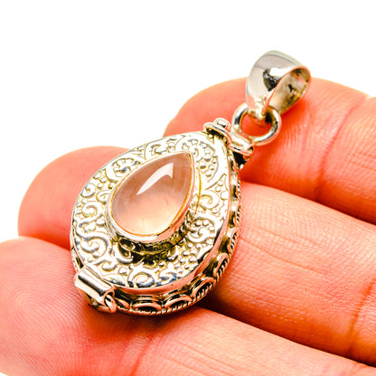 Teardrop rose quartz pendant in ornate 925 sterling silver setting, top bail loop