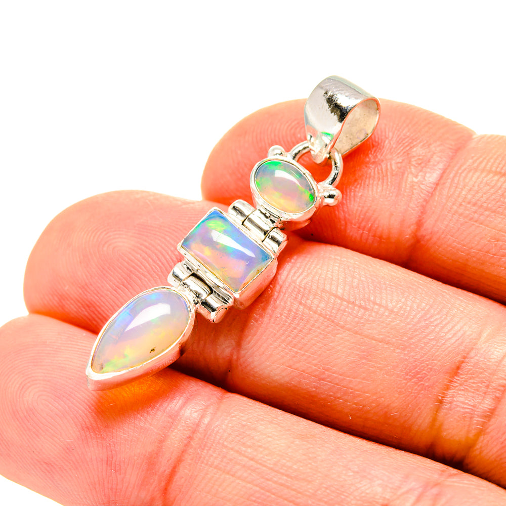 Sterling silver opal pendant with rainbow opal stones