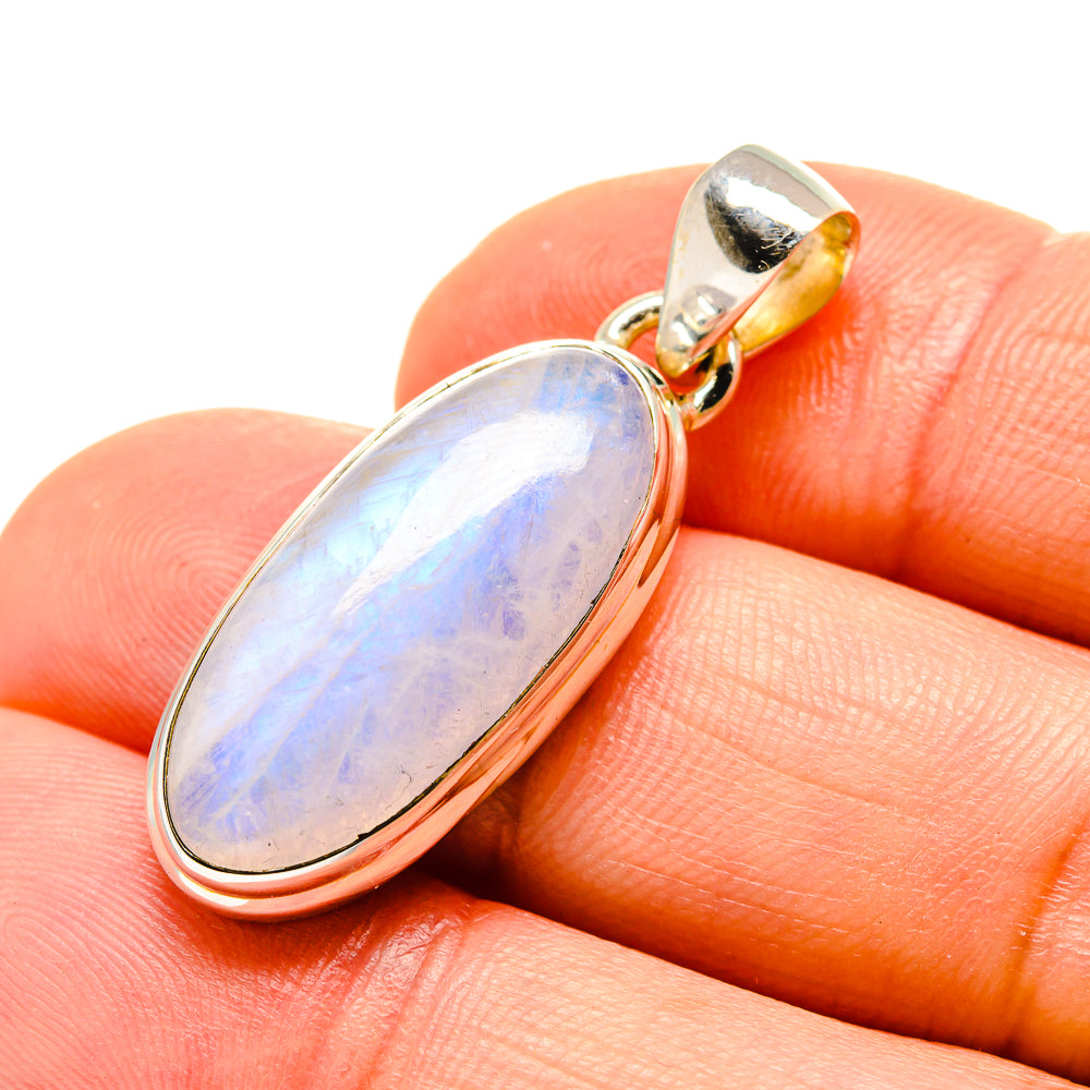 Oval rainbow moonstone pendant close-up, 925 sterling silver setting and bail