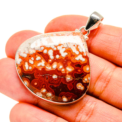 Ocean jasper pendant in 925 sterling silver, orange-white swirled stone